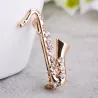 Saxophone cristal doré - broche