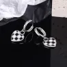 Round earrings with hanging check heartEarrings