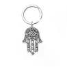 Chakra Hamsa käsi / luonnollinen kuusikulmainen kivi - avaimenperä