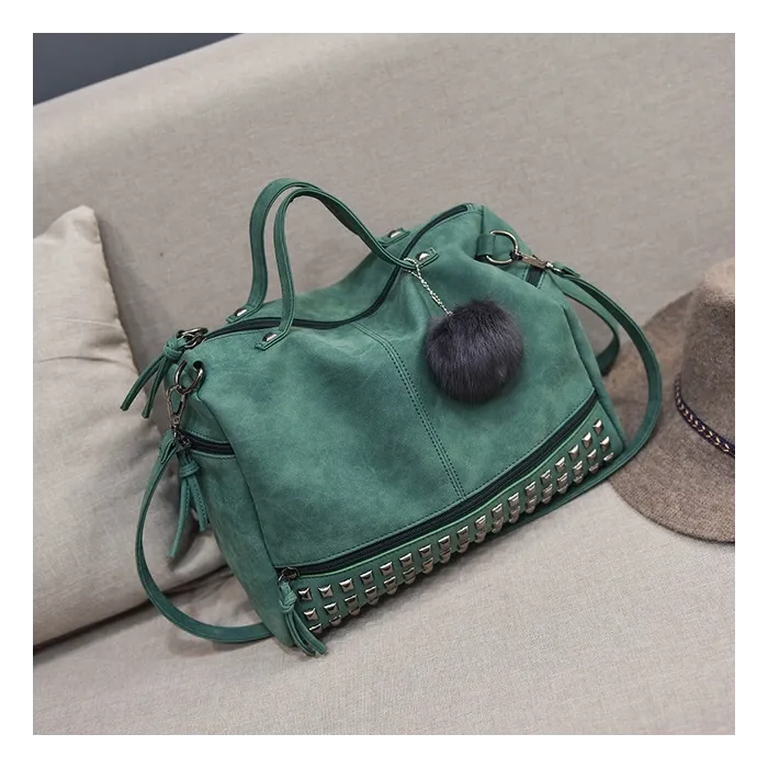 Vintage Tasche aus Nubukleder mit Nieten / Fellbommel