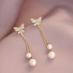 Boucles d'oreilles longues dorées - papillon / perles
