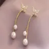 Długie złote kolczyki - motyle / perełkiKolczyki