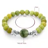 Perles en pierre naturelle verte / éléphant argenté - bracelet