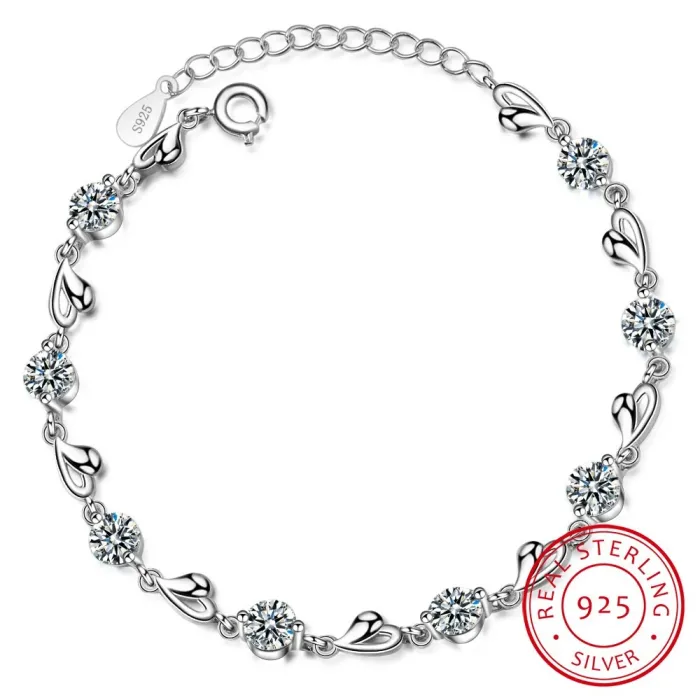 Elegancka bransoletka - cyrkoniowe kwiaty - serca - srebro próby 925Bransoletki