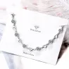 Elegancka bransoletka - cyrkoniowe kwiaty - serca - srebro próby 925Bransoletki