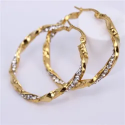 Boucles d'oreilles créoles dorées avec cristaux