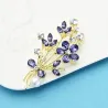 Fleurs en cristal violet avec perle - broche