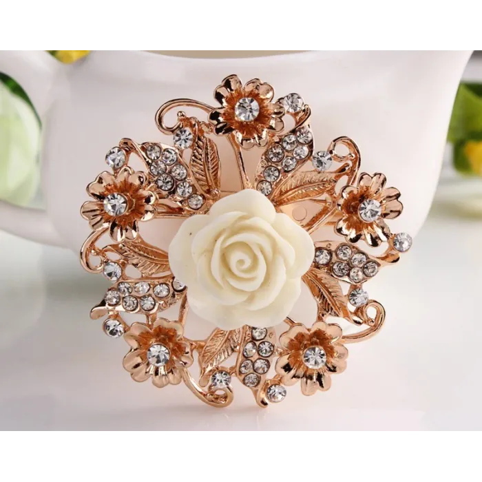 Fiore rosa in resina con cristalli - spilla a spillo