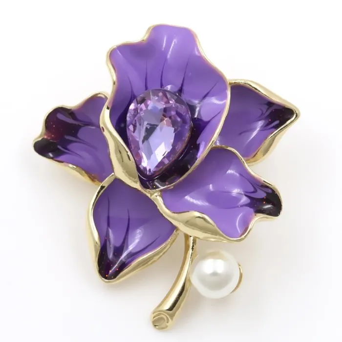 Blomst med krystal / perle - gylden broche