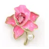 Flor com cristal/pérola - broche dourado