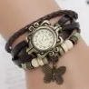 PulseraPulsera vintage multicapa - con reloj de cuarzo - abalorios / mariposa
