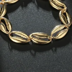 Bracelet de cheville coquillage doré