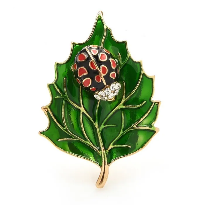 Broche med bille og blad
