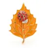 Spilla con scarabeo e foglia