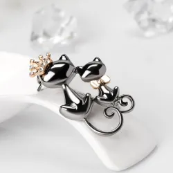 Broche double chats