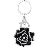 Chaveiro de metal com cristal rosa
