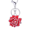 Chaveiro de metal com cristal rosa