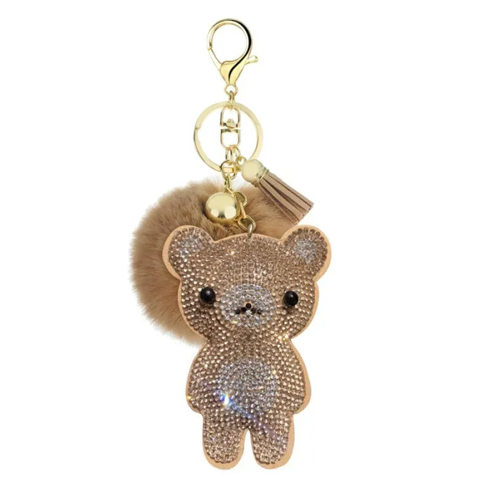 Ursinho de cristal com pompom de pelo - chaveiro