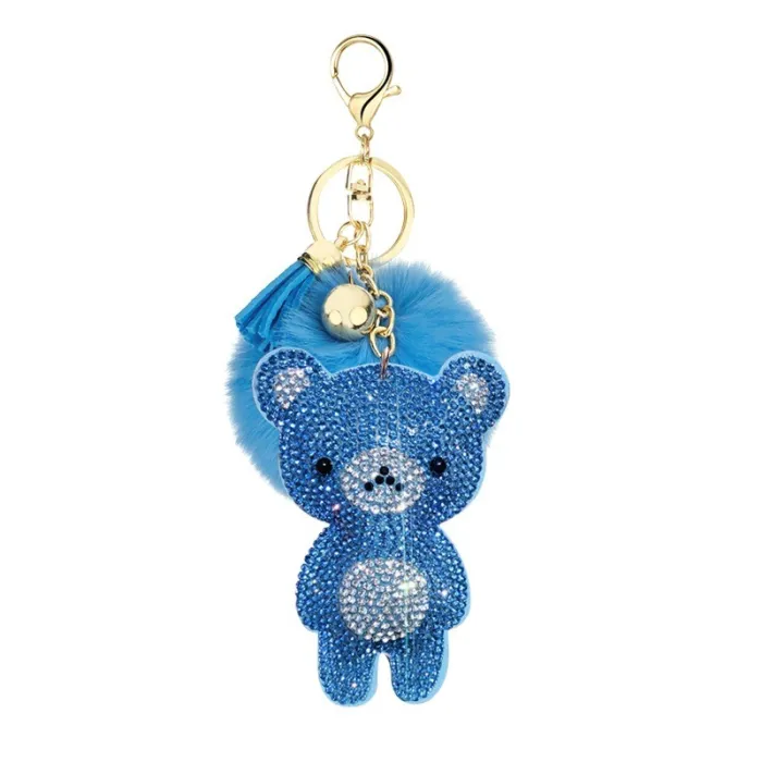 Ourson en cristal avec pompon en fourrure - porte-clés