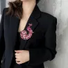 broche de pavão de cristal