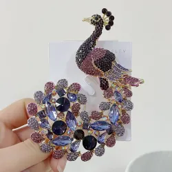 broche de pavão de cristal
