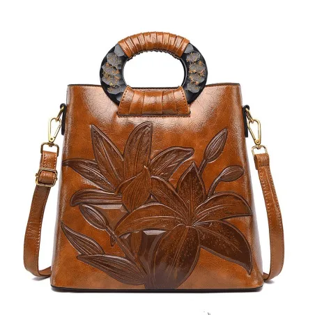 Elegant skuldertaske i læder - trykte blomster