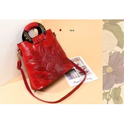 Elegant skuldertaske i læder - trykte blomster
