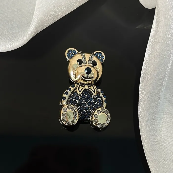 broche de urso de cristal