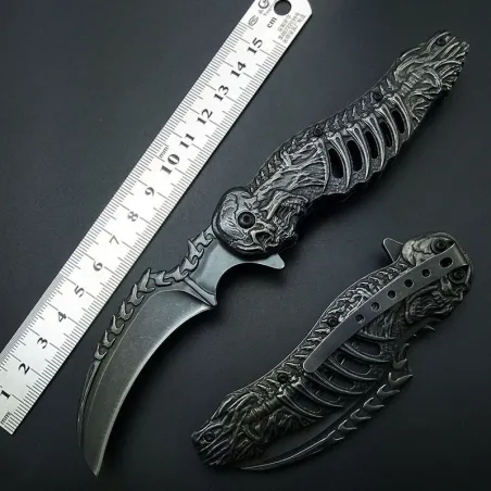 Sammenleggbar taktisk kniv - design med hodeskalle