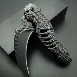 Couteau tactique pliable - conception de griffe de crâne