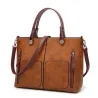 Elegant skulderveske i skinn