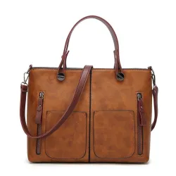 Elegante leren schoudertasTassen