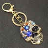 Golden keychain with crystal skullKeyrings