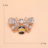 Krystal bi broche