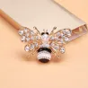 Krystal bi broche