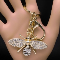 Porte-clés doré avec une abeille en cristal