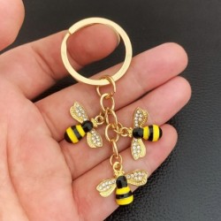 Abeilles en cristal / nid d'abeille - porte-clés doré