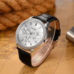 OUKESHI - Montre à quartz en acier inoxydable - bracelet cuir