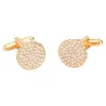Round gold cufflinks with crystalsCufflinks