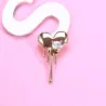 BrochesBroche en forma de corazón con circonitas