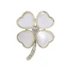 Broche trèfle à quatre feuilles - coquillage / cristal