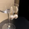 Brincos de cristal com uma pérola