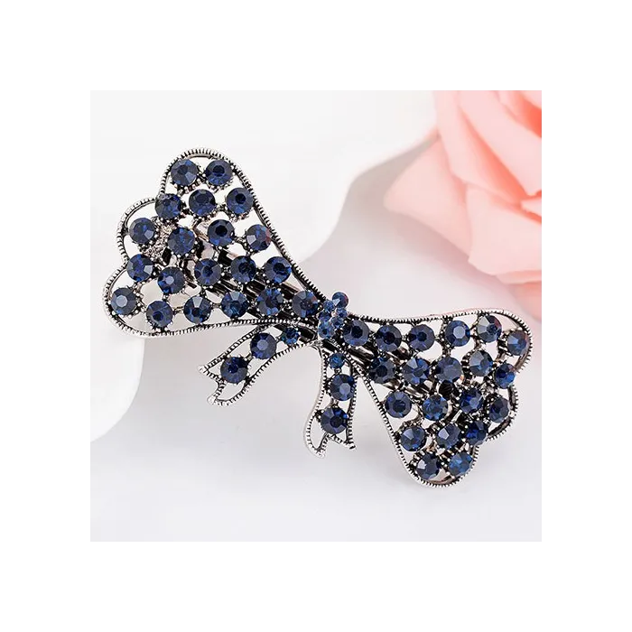 Elegante blauwe kristallen haarspeld - bloemen / vlinders / strikHaarspelden