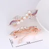 Élégante épingle à cheveux dorée - feuilles de cristal / perles