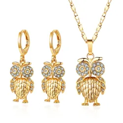 Goldenes Schmuckset - mit Kristalleulen - Halskette / Ohrringe