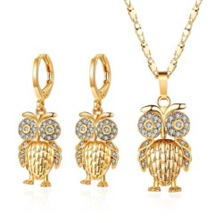 Gyldne smykkesæt - med krystalugler - halskæde / øreringe