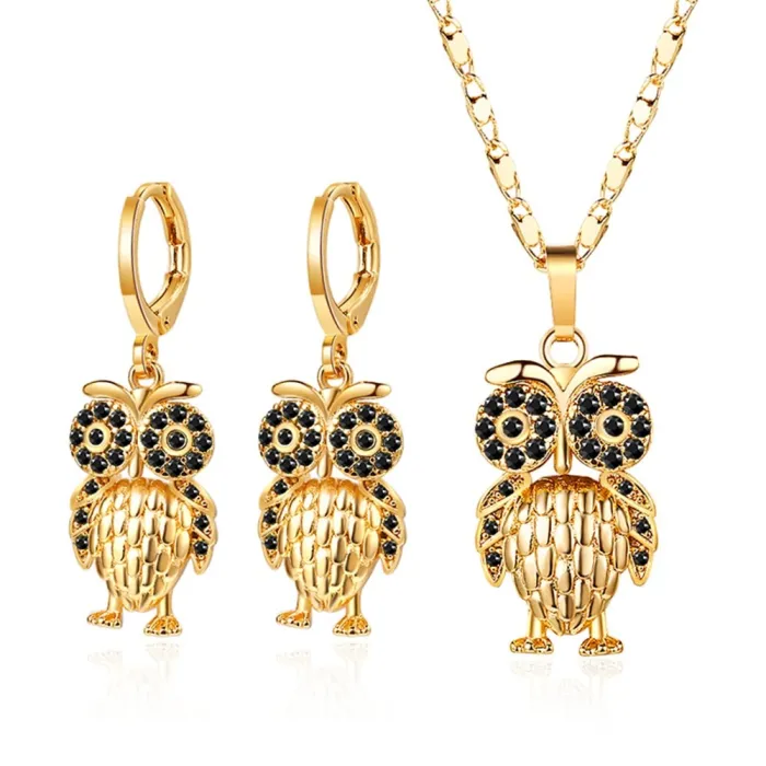 Goldenes Schmuckset - mit Kristalleulen - Halskette / Ohrringe