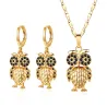 Goldenes Schmuckset - mit Kristalleulen - Halskette / Ohrringe