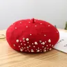 Gestrickte Wollmütze - mit Perlen / Kristallen