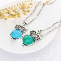Silversmyckeset - med ugglor - halsband / örhängen / armband